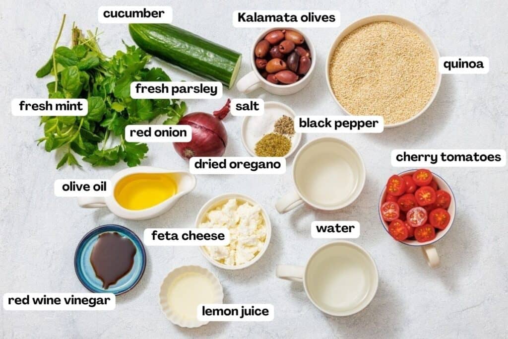 Ingredients for a Mediterranean salad include cucumber, Kalamata olives, quinoa, fresh herbs, cherry tomatoes, red onion, olive oil, feta cheese, vinegar, lemon juice, and seasonings.