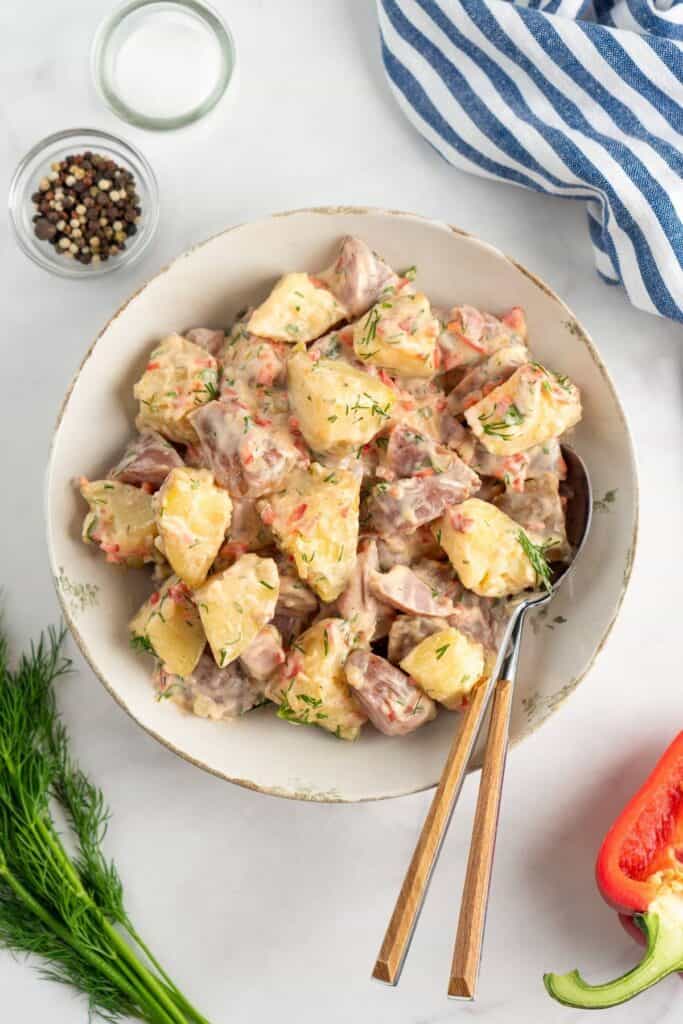 Photo of a delicious Creamy Red Potato Salad with Pickle.