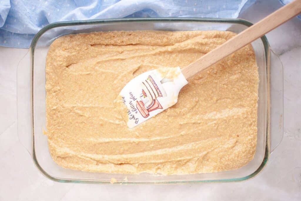 Placing the mixture on a prepared pan.