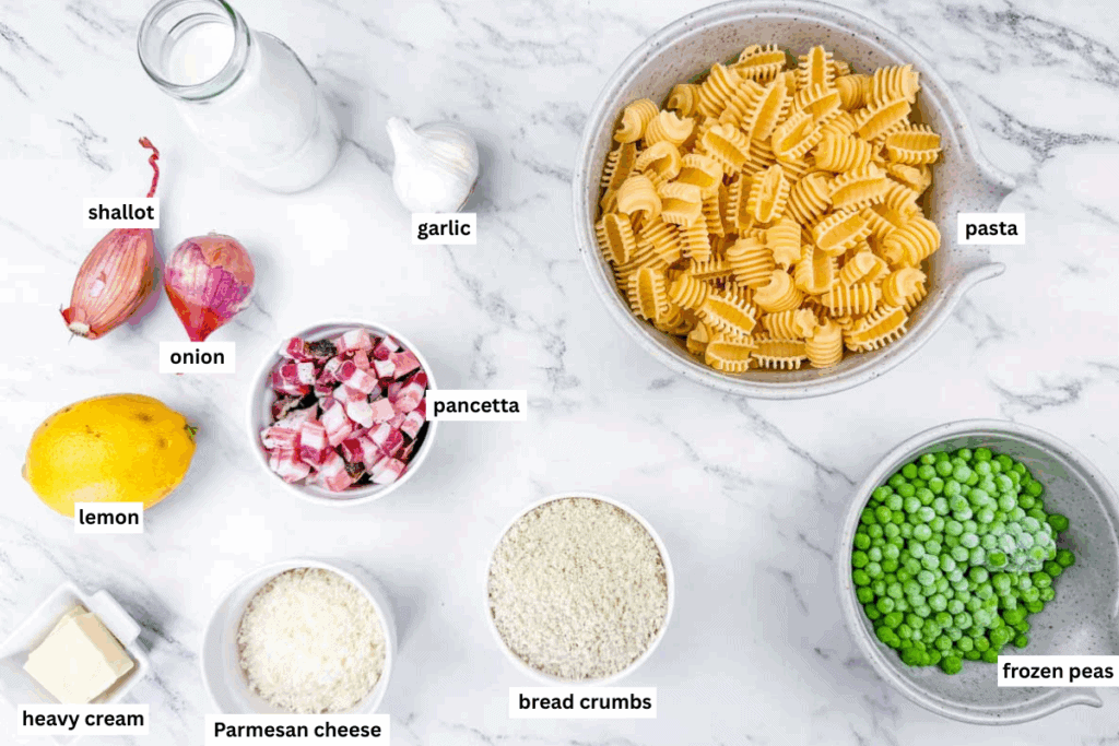 Variety of ingredients for Creamy Lemon Pasta with Peas and Pancetta