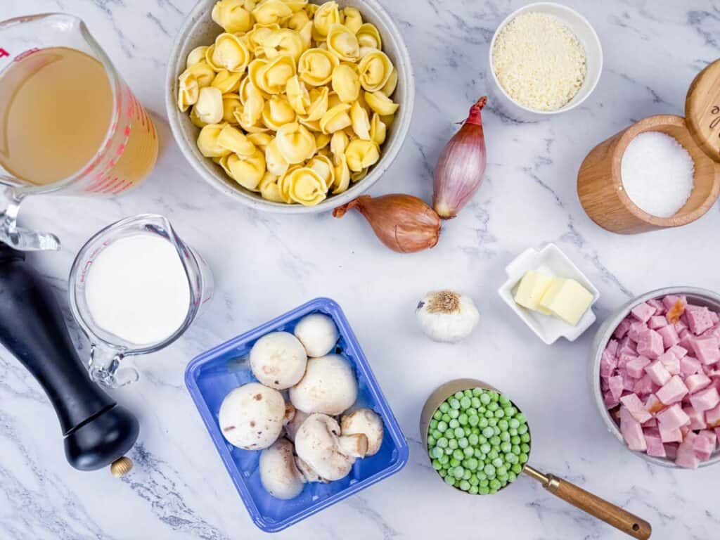 Ingredients for Ham & Cheese Tortellini with Peas and Mushrooms.