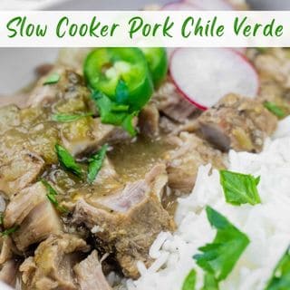 A close-up of slow cooker pork chile verde served with white rice, garnished with sliced jalapeño, radish, and chopped green onions.