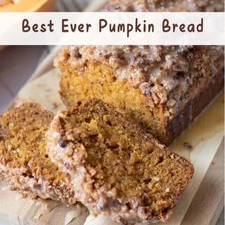 A loaf of pumpkin bread with a crumb topping is sliced on a wooden board. Text at the top reads "Best Ever Pumpkin Bread.
