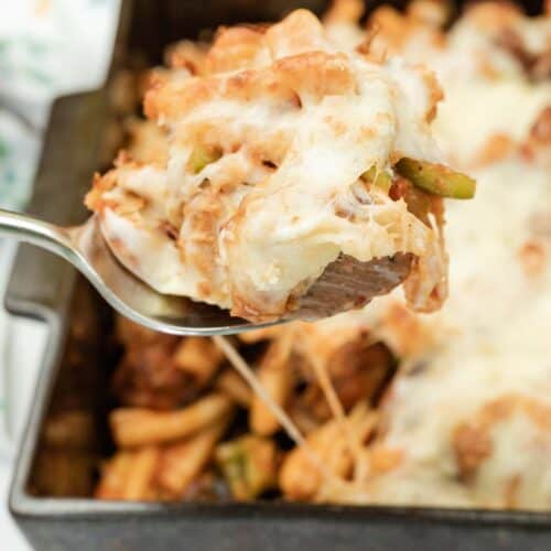 Close-up shot of a spoonful of Cheesy Meatball Casserole.