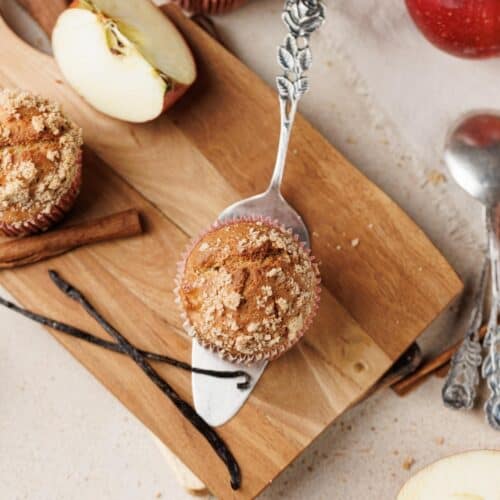 Crispy baked cupcakes cooling on a wire rack.