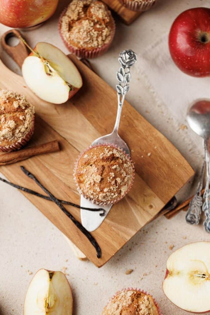 Crispy baked cupcakes cooling on a wire rack.