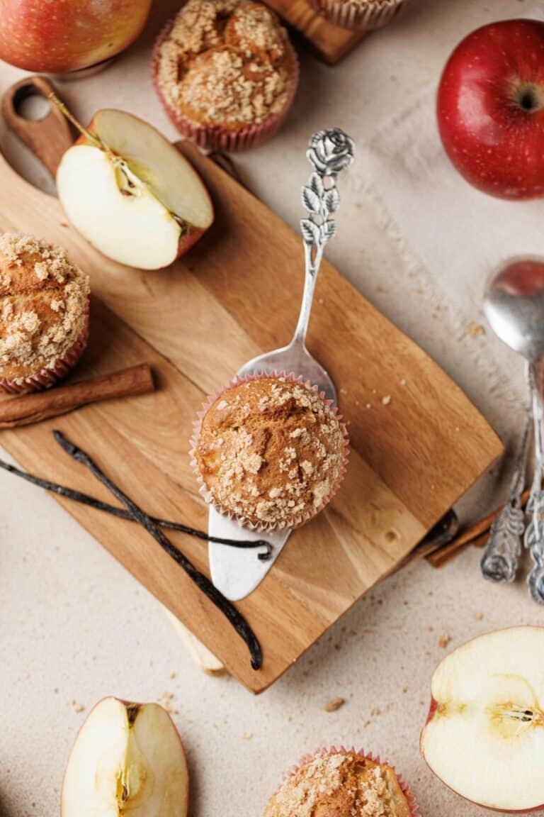 Crispy baked cupcakes cooling on a wire rack.