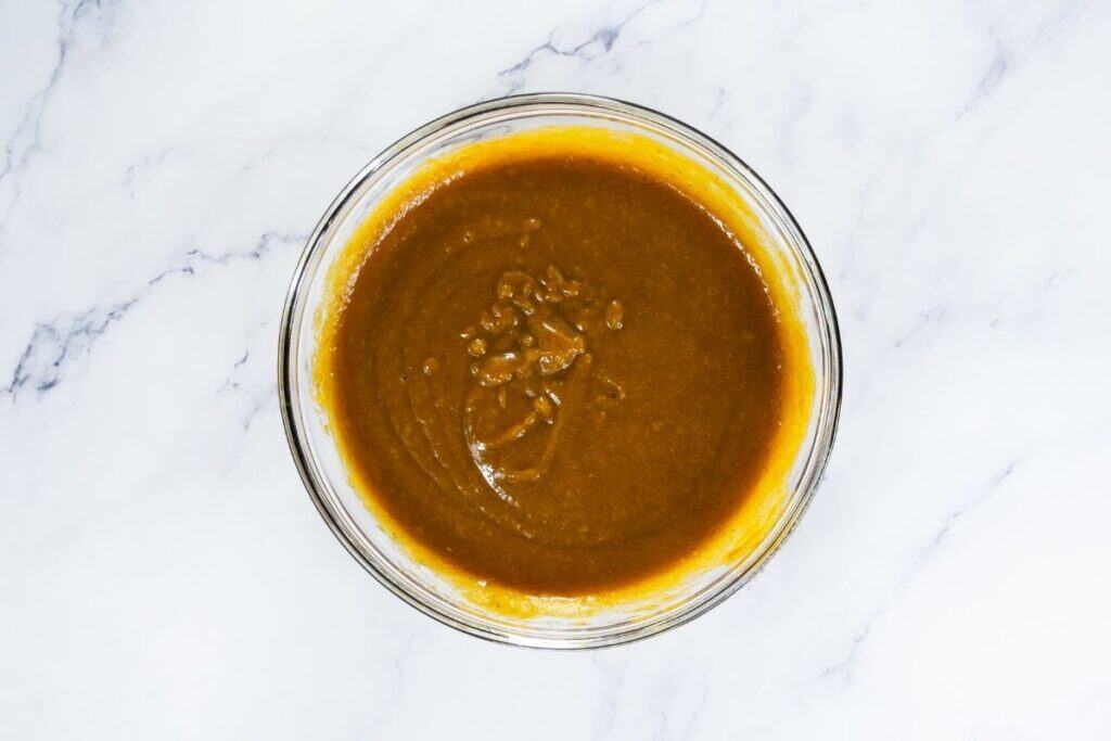 Bowl of pumpkin filling mixture.