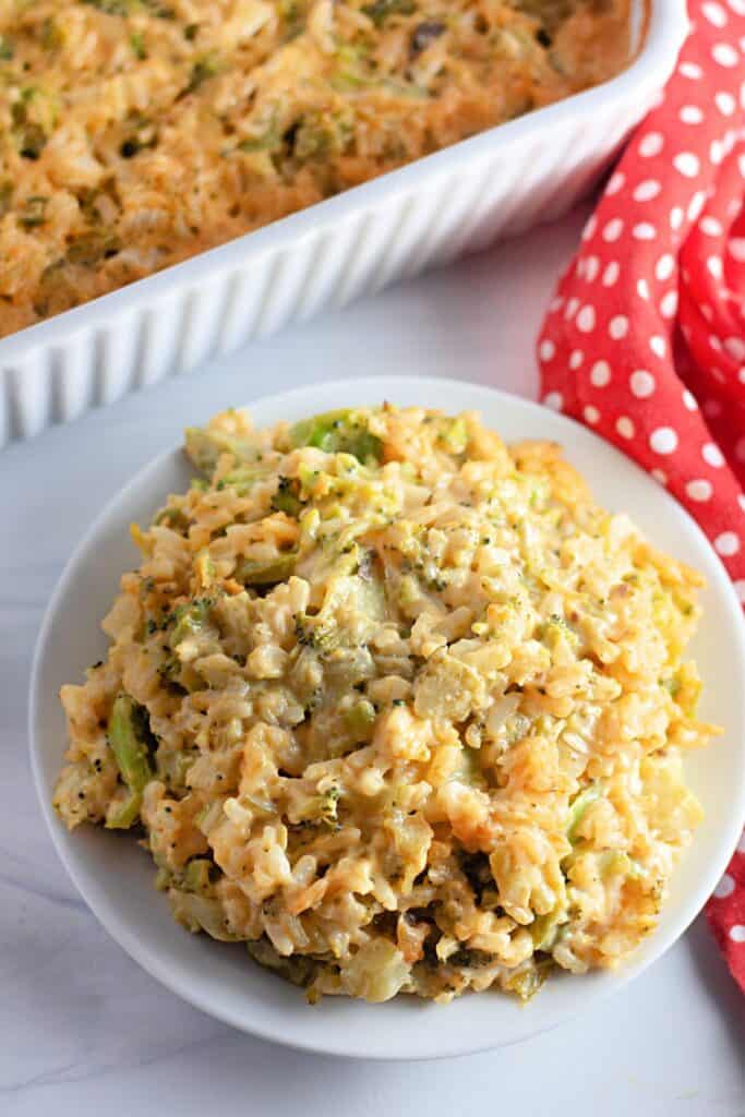 Creamy broccoli and chicken casserole in a white bowl, served fresh.