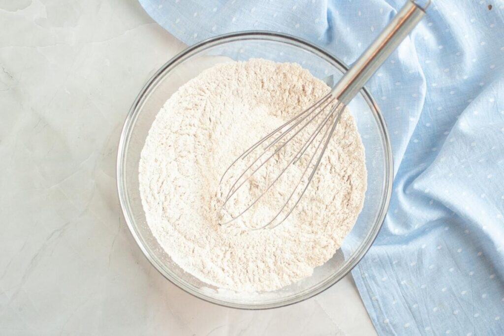 Sift together the flour, baking powder, baking soda, salt, and pumpkin spice.