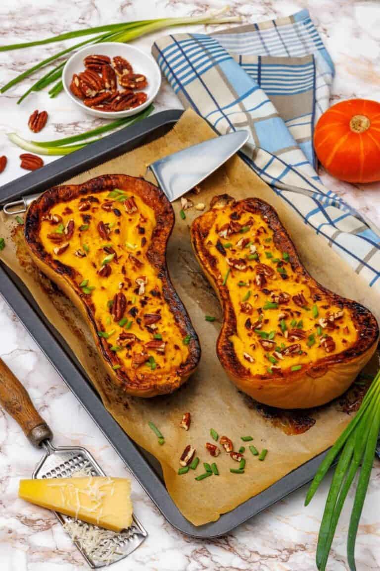 Butternut squash mash with Parmesan served on a sheet pan atop a baking pan.