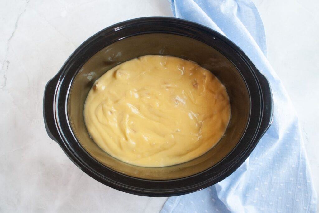 Spoon the cream of chicken soup.