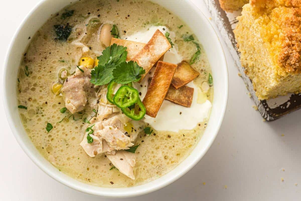 Rich and creamy white chicken chili loaded with chicken, beans, and corn.