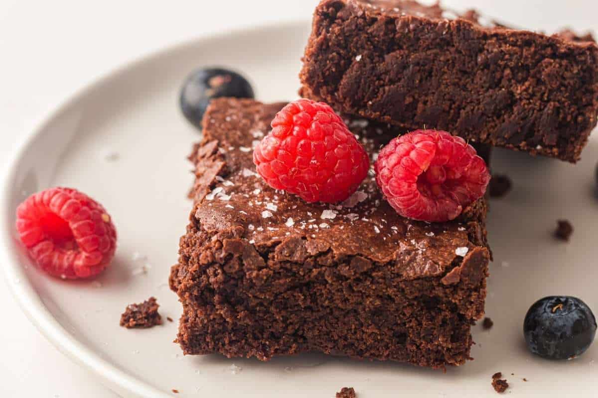 Sheet pan brownies with a shiny, crackly chocolate top.