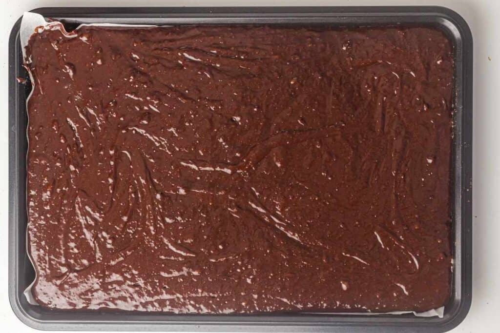 The prepared pan is filled with the batter.