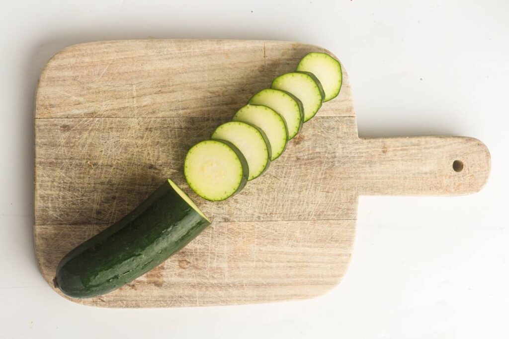 Slice the zucchini into coins.