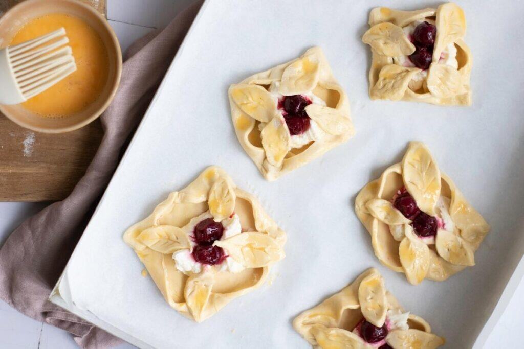 Brush the edges with egg wash.