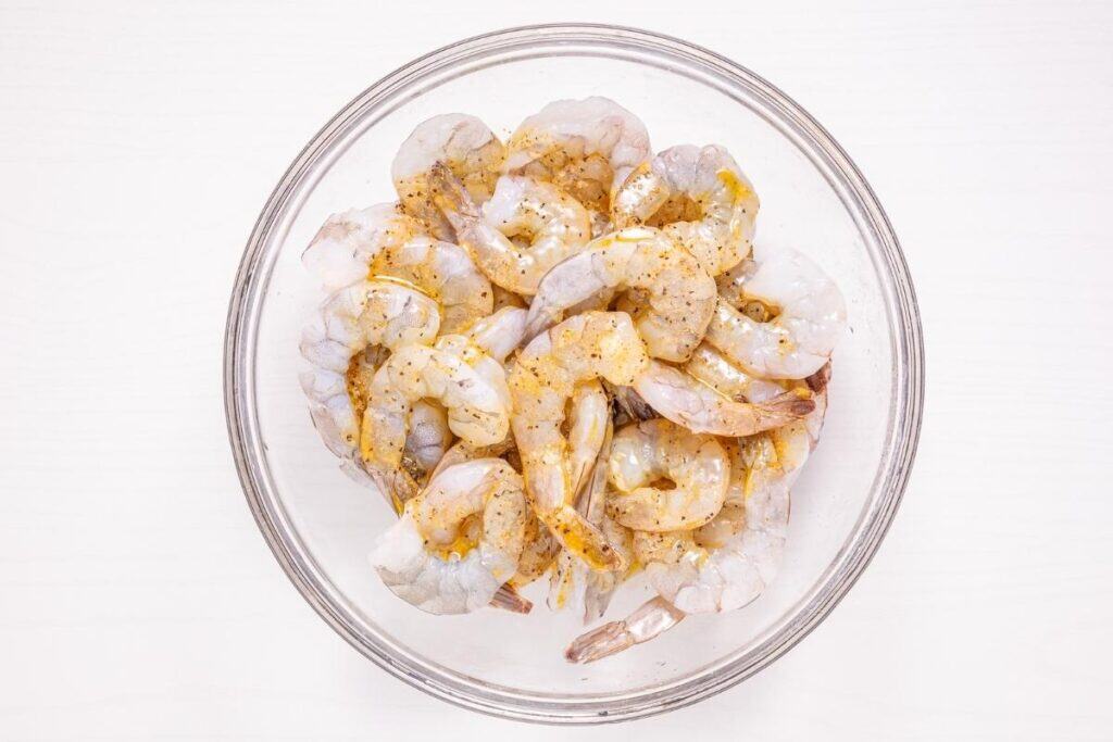 Shrimp in a glass bowl, perfect for seafood dishes and meal prep.