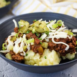 A black bowl of Sloppy Joe Mashed Potato.