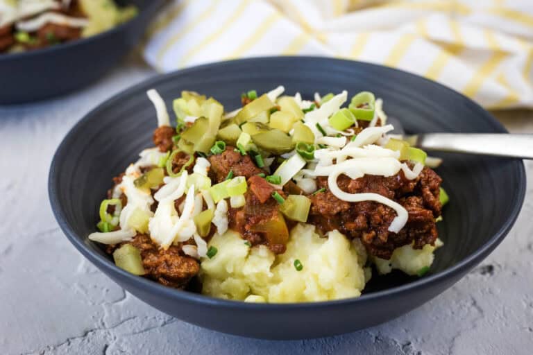 A black bowl of Sloppy Joe Mashed Potato.